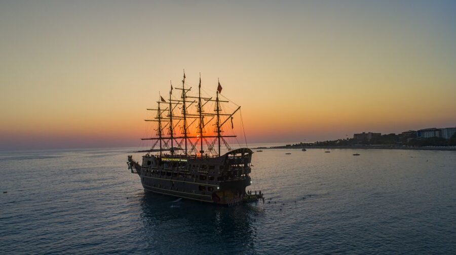 Alanya: Sunset Cruise and Party Boat - Seeing Alanya Castle and the Red Tower from offshore
