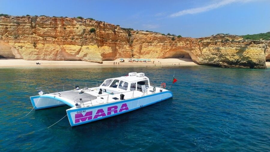 Albufeira: Catamaran Cruise with BBQ & Open Bar on the Beach - A beach stop with a barbecue lunch