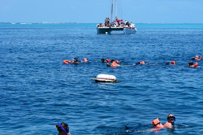 Amazing tour to the beauty Isla Mujeres with Snorkel and open bar - Sunset on the return to Cancun