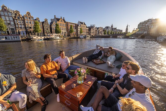 Amsterdam 2 Hour Small-Group Canal Cruise with Dutch Snacks & Bar - Why a small electric boat changes the experience