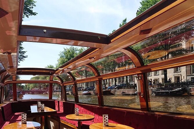 Amsterdam 2 Hour Small-Group Canal Cruise with Dutch Snacks & Bar - Anne Frank House and Westerkerk from the water