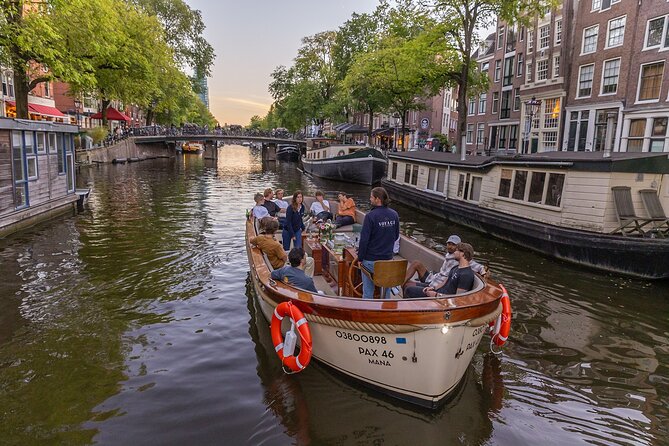 Amsterdam 2 Hour Small-Group Canal Cruise with Dutch Snacks & Bar - Commentary quality depends on the skipper