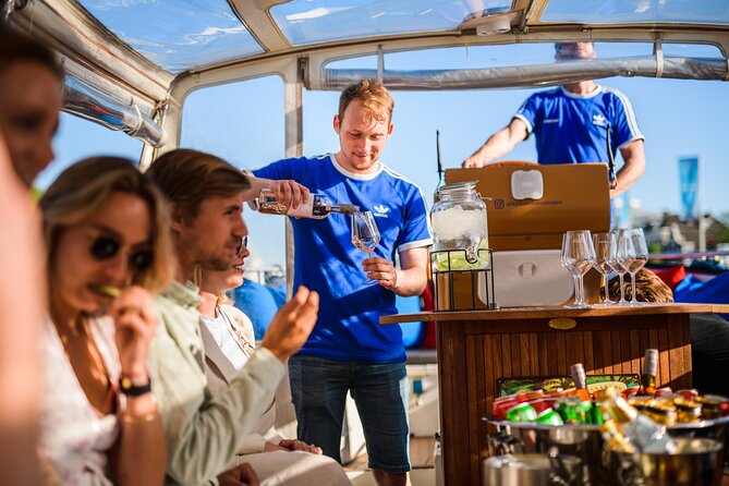 Amsterdam: Canal Booze Cruise with Unlimited Drinks Option - Drinks, snacks, and the real value of the price