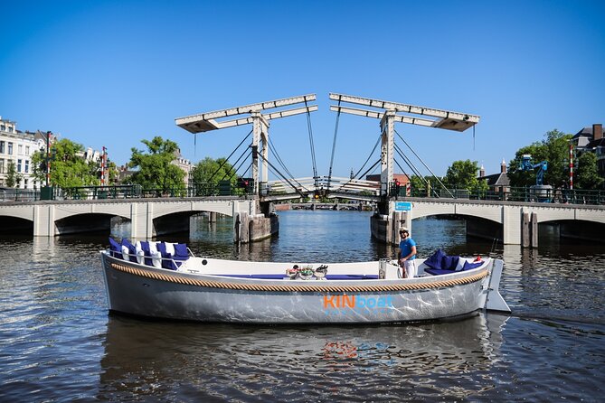 Amsterdam Canal Cruise in Open Boat with Unlimited Drinks Option - Open-air views, glass cover, and weather
