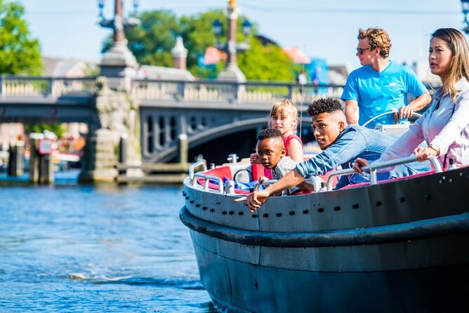 Amsterdam Canal Cruise in Open Boat with Unlimited Drinks Option - The guide can make or break the hour