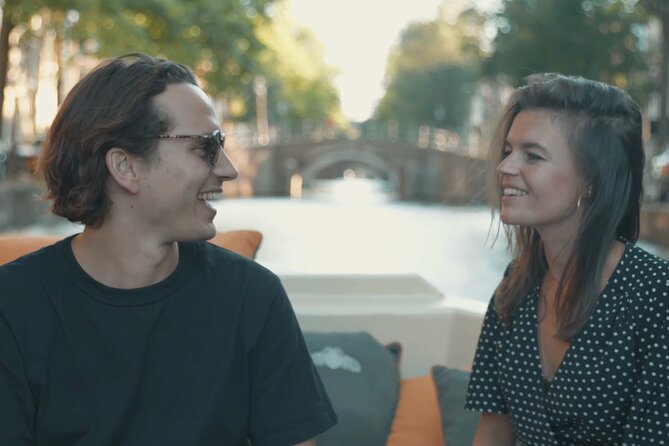 Amsterdam Canal Cruise with German Guide and unlimited drinks - The Love Bridge and Amsterdam’s famous sights