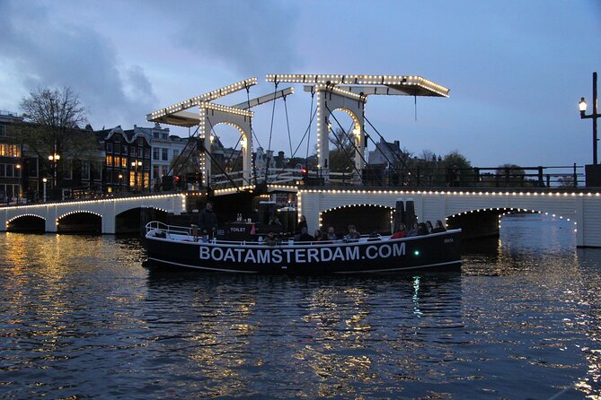Amsterdam Canal Cruise with Open Bar - Central Station - Montelbaanstoren, Rembrandt, and Waterlooplein