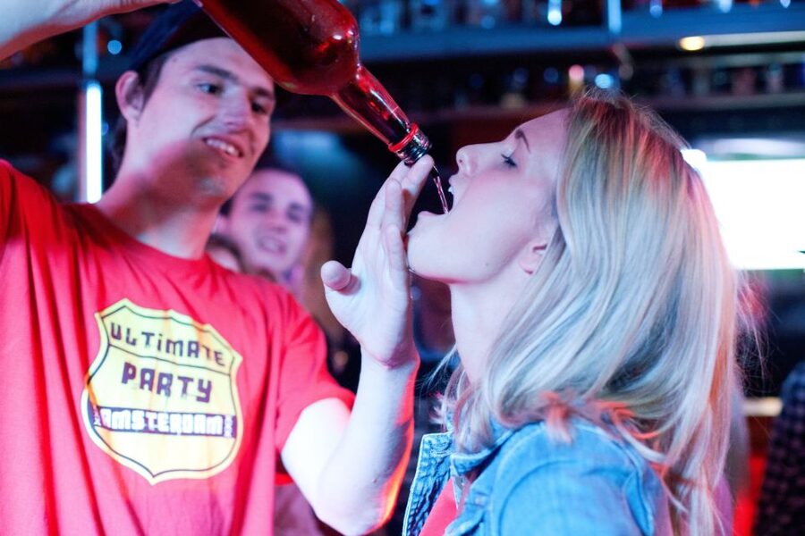 Amsterdam: City Center Bar Crawl and Nightlife Experience - Clothing, identification, and street logistics
