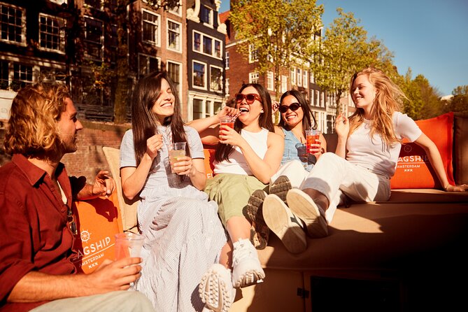 Amsterdam Classic Saloon Boat Canal Cruise with Live Guide - Stopera, where city hall meets opera
