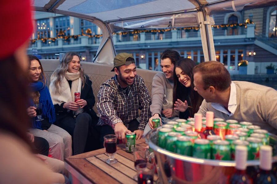 Amsterdam: Covered Canal Booze Cruise with Unlimited Drinks - Following the route through central Amsterdam