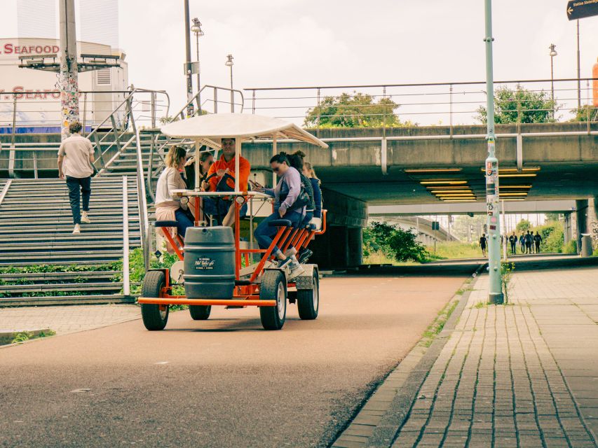 Amsterdam: Dutch Beer Bike Blast Tour with Onboard Bar - A short stop at Coffeeshop Sloterdijk