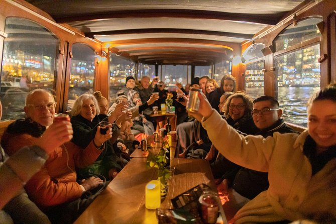 Amsterdam Evening Canal Cruise with Live Guide and Onboard Bar - The canal ring and the art of seeing through bridges