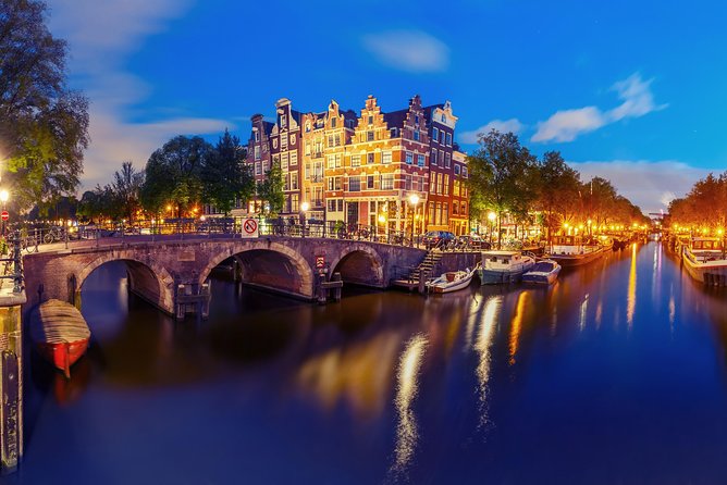 Amsterdam Evening Canal Cruise with Live Guide and Onboard Bar - The Amstel, Magere Brug, and the city’s beginnings