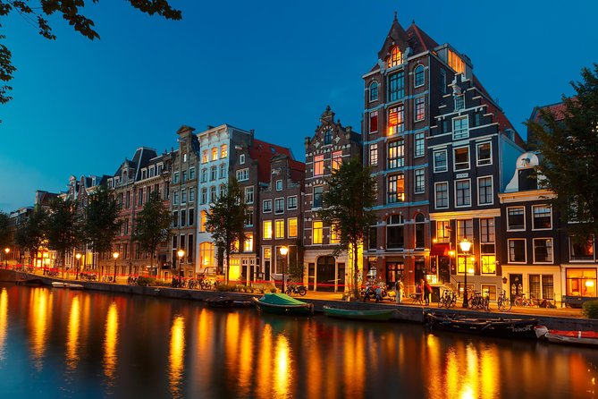 Amsterdam Evening Canal Cruise with Live Guide and Onboard Bar - The Rijksmuseum, Flower Market, and Munttoren