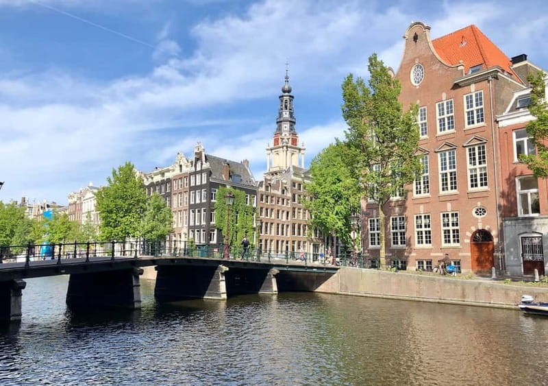 Amsterdam: German Canal Cruise with Unlimited Drinks Option - Why a canal cruise is the right first look at Amsterdam