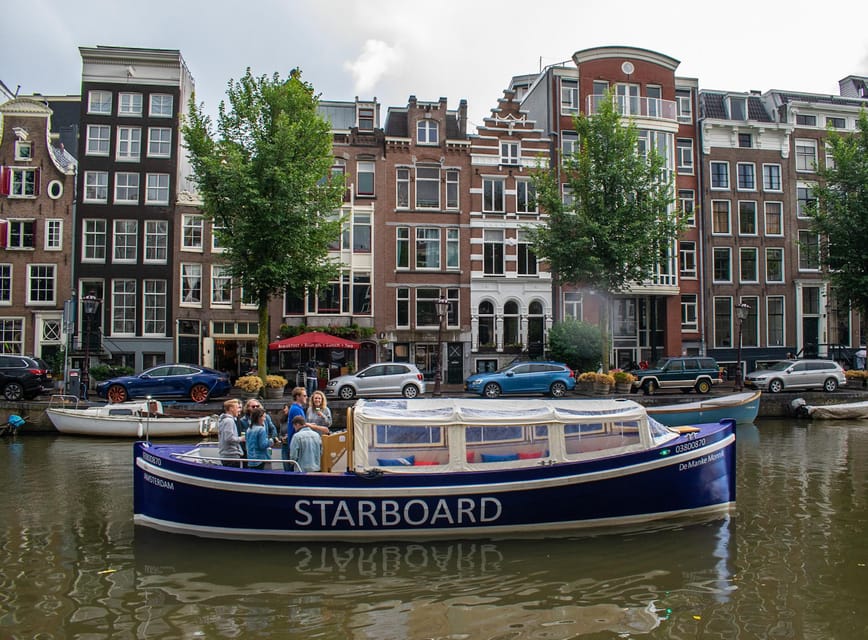 Amsterdam: German Guided Canal Cruise with on Board Bar - Munttoren, Oude Kerk, and Amsterdam’s oldest core