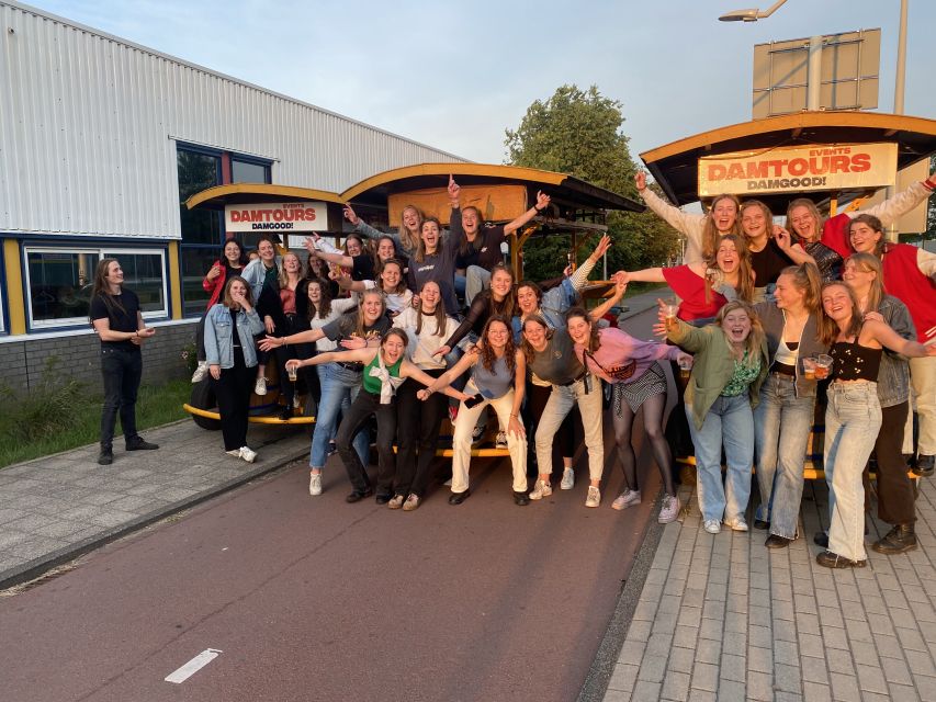 Amsterdam: Guided Beer Bike or Prosecco Bike Tour - Music, games, and the guide’s role