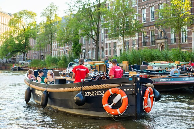 Amsterdam: Guided Open Boat Canal Cruise Unlimited Drinks Option - The Rijksmuseum and Museumplein from the water