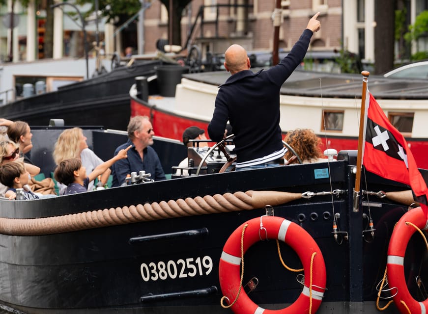 Amsterdam: Guided Open Boat Cruise Unlimited Drinks Option - The eastern canal belt and old Amsterdam