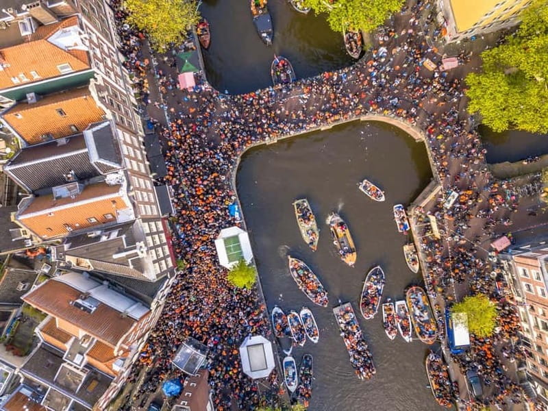 Amsterdam: Kings Day Boat Party with Unlimited Drinks - Finding the boat at Stationsplein 40