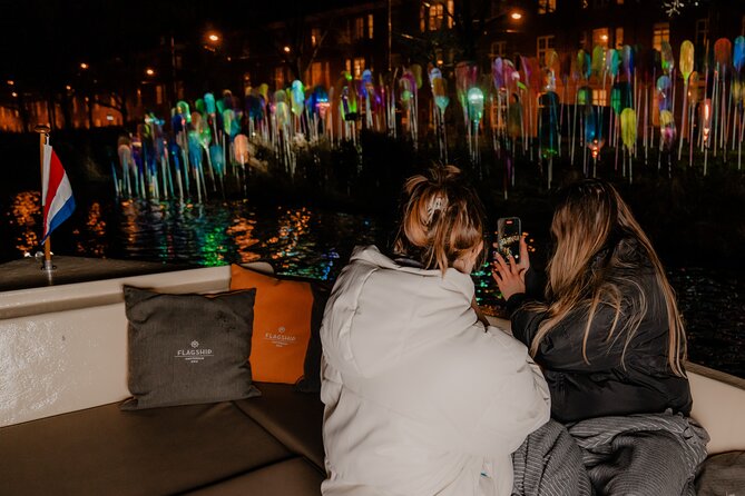 Amsterdam Light Festival: Canal Cruise + Bite & Unlimited Drinks - Seeing Amsterdam’s Light Festival from the water