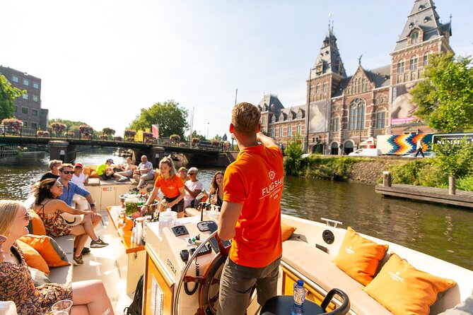 Amsterdam Luxury Canal Cruise + Unlimited Drinks & Bites option - Leidseplein, Bloemenmarkt, and the Bridge of 15 Bridges