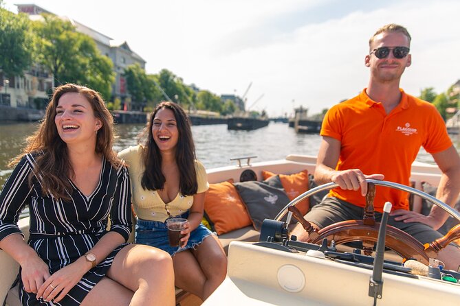 Amsterdam Luxury Canal Cruise + Unlimited Drinks & Bites option - The Amstel, Magere Brug, and Munttoren