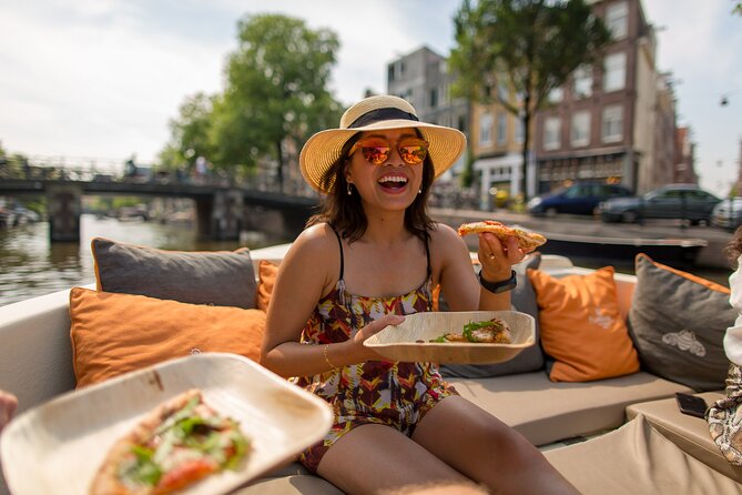 Amsterdam Private Boat Trip with Pizza and Unlimited Drinks - What this private Amsterdam cruise actually offers