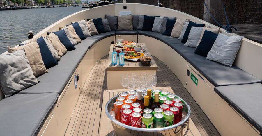 Amsterdam: Private Canal Booze Cruise with Unlimited Drinks - NEMO Science Museum and the eastern canal views
