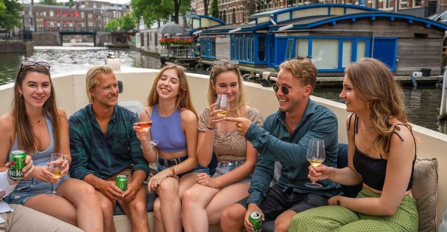Amsterdam: Red-Light District Pub Crawl and Booze Boat Tour - Changing from boat time to Red Light District nightlife