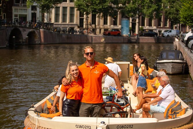 Amsterdam: Saloon Boat Cruise + Unlimited Drinks & Bite option - The rare view through several bridges
