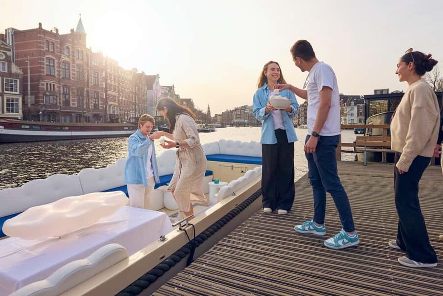 Amsterdam: Smoke & Cruise on covered Cannabis Boat With Bar - Fifteen minutes through the central canals