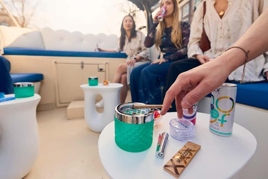 Amsterdam: Smoke & Cruise on covered Cannabis Boat With Bar - Covered boats, blankets, drinks, and cold weather