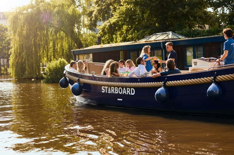 Amsterdam: Spanish Guided Open Boat Cruise with Bar Onboard - The Canal Belt and the grand Herengracht
