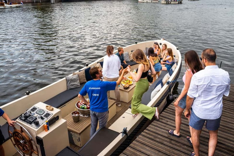 Amsterdam: Spanish Guided Open Boat Cruise with Bar Onboard - Open-air comfort from March through October