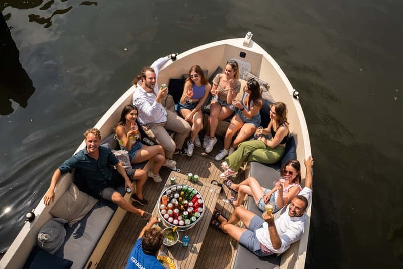 Amsterdam: Spanish Guided Open Boat Cruise with Bar Onboard - Drinks onboard, and what you pay for