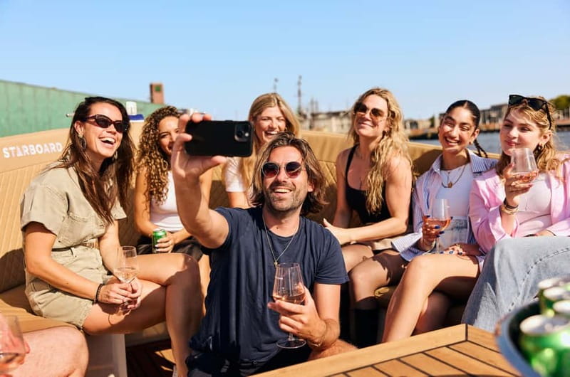 Amsterdam: Spanish Guided Open Boat Cruise with Bar Onboard - Meeting Starboard Boats and getting ready to sail