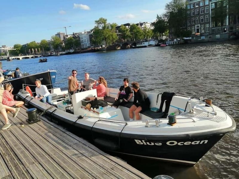 Amsterdam: The Bulldog Boat Smoke and Booze Cruise - Following the old city wall into Amsterdam’s canals