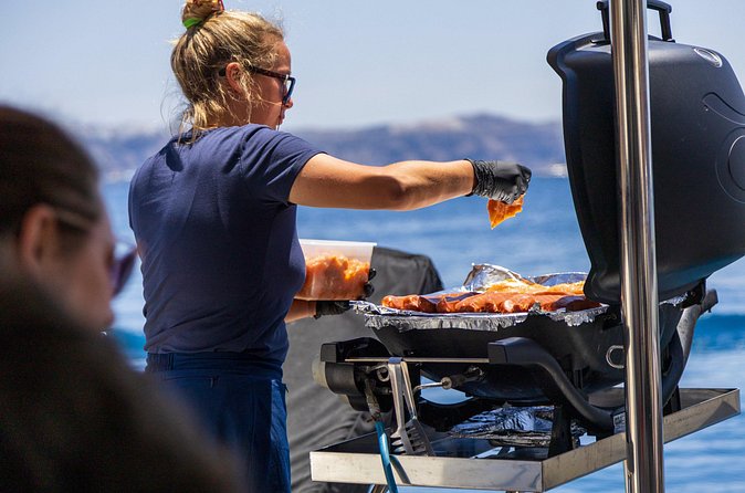 Athens Private Cruise with Meal, Open Bar & Transfer - Open bar, water, towels, and snorkeling gear