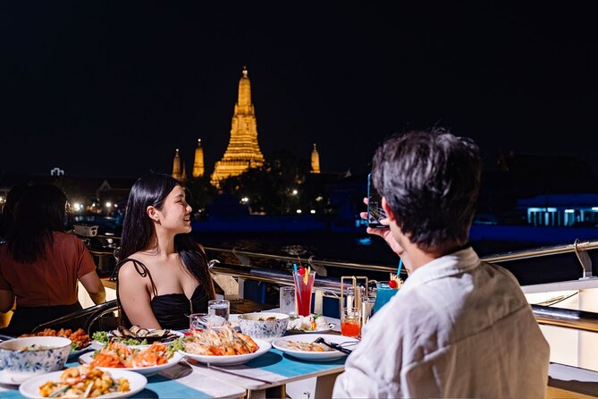 Bangkok Carnival Dinner Cruise with Free-flow Beer and Buffet - Wat Arun after sunset