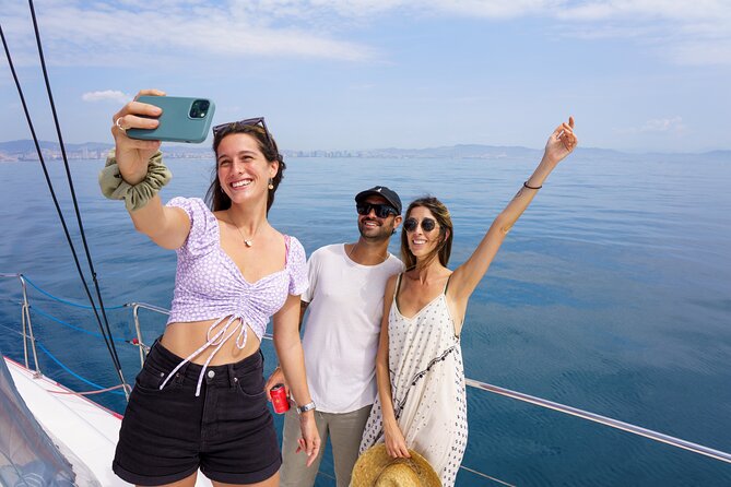 Barcelona Catamaran Cruise with Tapa & Drink Included - What the crew adds to the experience