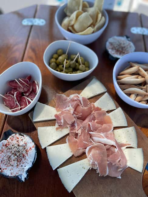 Barcelona: Sailing with Open Bar, Catalan Snack & Swim Stop - Catalan snacks, drinks, and the open bar