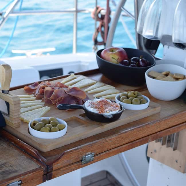 Barcelona: Sailing with Open Bar, Catalan Snack & Swim Stop - How the skippers shape the experience