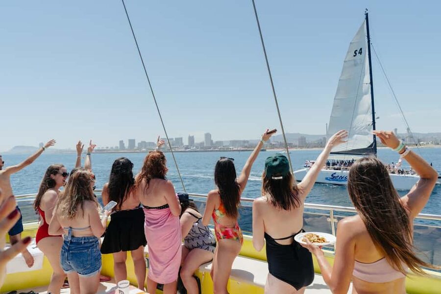 Barcelona: Snack, Swim & Party Boat - The Barcelona coast from a catamaran