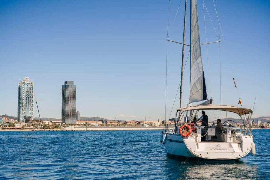 Barcelona Sunset Sailing Experience with open bar and snakcs - Watching Barcelona from Port Olímpic
