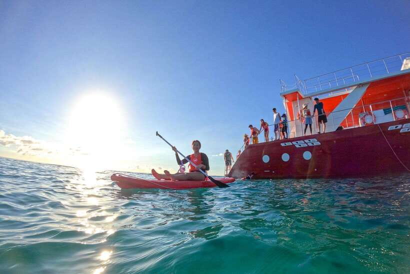 Boracay: Red Whale Party Cruise w/ Snacks & Water Activities - Settling in with pika-pika and drinks