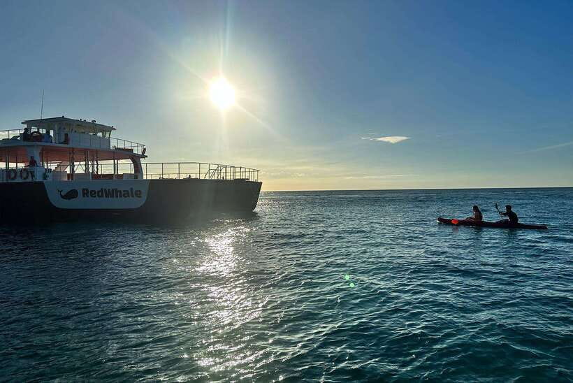 Boracay: Red Whale Party Cruise w/ Snacks & Water Activities - The boat deck, music, and social mood