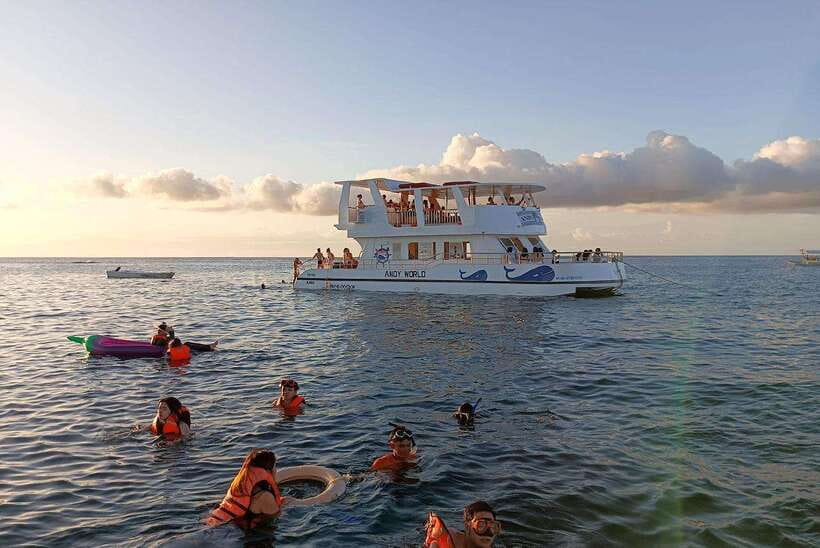 Boracay: Ultimate Party Cruise aboard the Andy World Yacht - Sunset views along Boracay’s coast
