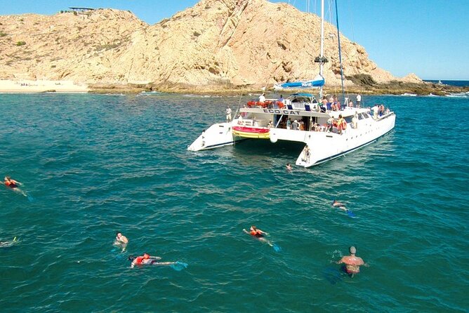 Cabo San Lucas Catamaran Cruise: Snorkel or Sunset Adventure - Open bar, music, and comfort on board