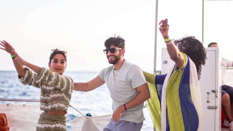 Cabo San Lucas: Sunset Party Cruise with Open Bar - Sunset on the Pacific, with a warning about rough water